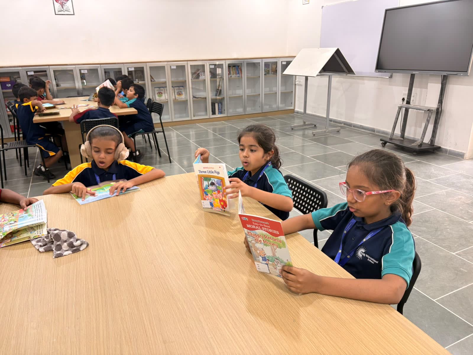 Students reading in the AARK library