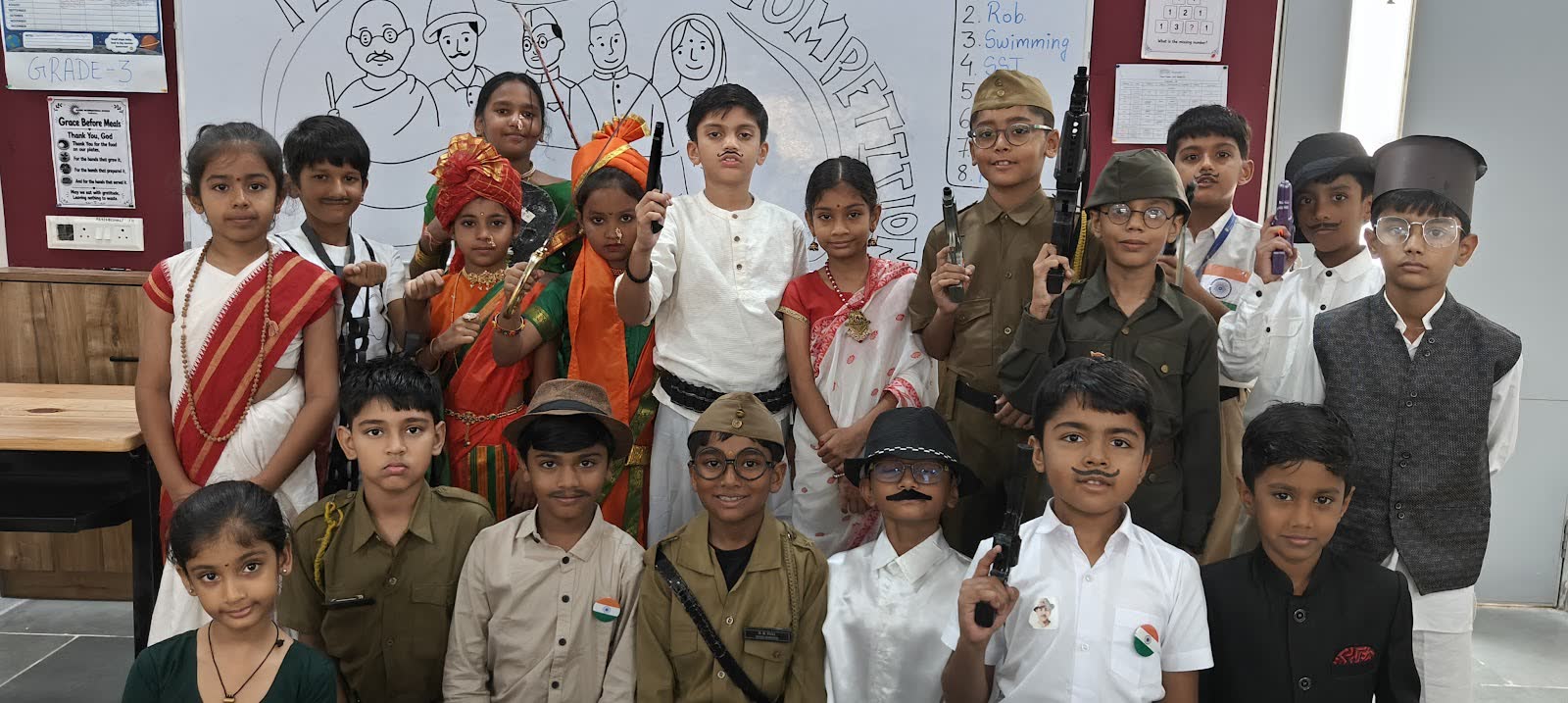 Students dressed as freedom fighters and leaders for a fancy dress competition