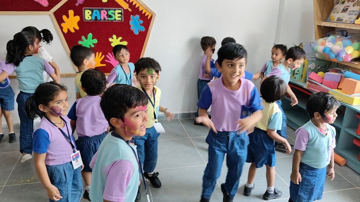 Young children playing together in a bright classroom
