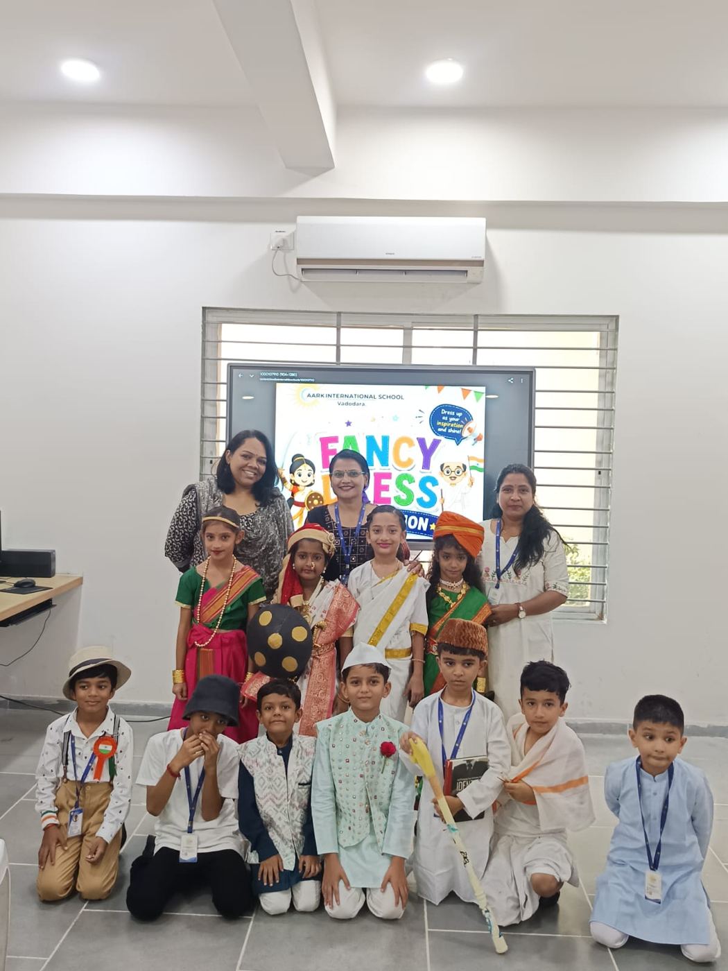 Students dressed as national leaders with their teachers